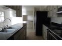 Kitchen with stainless steel appliances and ample counter space at 3706 Joe Sanchez Rd, Plant City, FL 33565