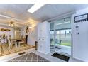 Bright dining area with table, chairs, and access to a patio at 5330 Vera St, Zephyrhills, FL 33542