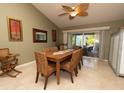 Spacious dining room with wooden table and seating at 8900 143Rd St, Seminole, FL 33776