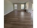 Spacious living room with new wood-look flooring at 2690 Coral Landings Blvd # 535, Palm Harbor, FL 34684