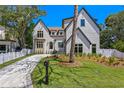 Charming home with well-manicured front lawn and appealing architectural details at 4633 W Lowell Ave, Tampa, FL 33629