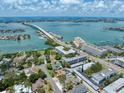 Aerial view of waterfront property near a bridge at 50 Harbor View Ln # 12A, Largo, FL 33770