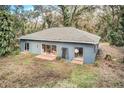 Single story home with backyard and partially cleared lot at 6650 Horton Rd, Plant City, FL 33567