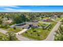 Aerial view of property featuring fenced yard, mature trees, and desirable neighborhood at 15272 Spinning Wheel Ln, Brooksville, FL 34604