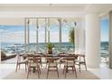 Elegant dining room with a large table and ocean views at 400 Central Ave # 1201, St Petersburg, FL 33701