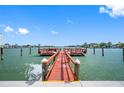 Community boardwalk leads to a relaxing dock at 6363 Gulf Winds Dr # 437, St Pete Beach, FL 33706