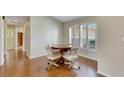 Cozy breakfast nook with a small table and chairs near a window at 719 Winterbrooke Way, Sun City Center, FL 33573