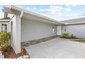 House exterior with walkway and landscaping at 7343 Brookview Cir, Tampa, FL 33634