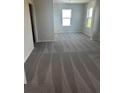 Spacious bedroom with neutral carpet, and dual windows allowing for natural light at 16021` 7Th E Ave, Bradenton, FL 34212