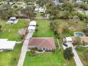 Aerial view of house, pool, and large yard at 801 Bama Rd, Brandon, FL 33511