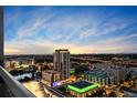 Stunning sunset aerial view of the city showcasing the building's prime location and expansive skyline at 777 N Ashley Dr # 2613, Tampa, FL 33602