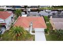 Waterfront home with tile roof and canal access at 9830 San Sierra Way, Port Richey, FL 34668