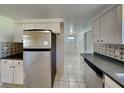 Kitchen with stainless steel appliances and dark countertops at 5301 82Nd N Ave, Pinellas Park, FL 33781
