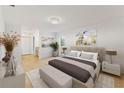 Spacious main bedroom with neutral decor and en-suite bathroom access at 5344 Lowell Ave, Spring Hill, FL 34609
