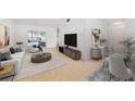 Bright living room with hardwood floors, contemporary furniture, and access to backyard at 5344 Lowell Ave, Spring Hill, FL 34609