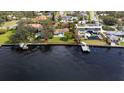 Aerial view of waterfront property with pool at 306 Blanca Ln, Tampa, FL 33606