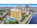 Luxury high-rise building with city skyline and river views at 345 Bayshore Blvd # 610, Tampa, FL 33606