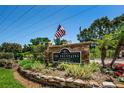 Stone entrance sign for The Fountains at Countryside at 2500 Winding Creek Blvd # E102, Clearwater, FL 33761