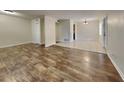 Living room with wood-look flooring at 315 Lime Tree Rd, Tampa, FL 33619
