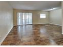 Spacious living room with sliding doors at 315 Lime Tree Rd, Tampa, FL 33619