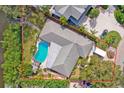An aerial view showcasing a home's layout, pool, and location at 5104 W San Jose St, Tampa, FL 33629