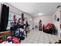 Living room with tiled floors and decorative items at 3336 W Heiter St, Tampa, FL 33607