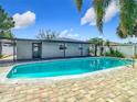 Inviting backyard oasis with a large swimming pool at 4105 W Carmen St, Tampa, FL 33609