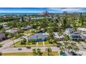 An aerial view of a light blue house and neighborhood at 3108 S Maritana Dr, St Pete Beach, FL 33706