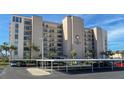 The Presidential 7000 building, showcasing parking and building signage at 7600 Sun Island S Dr # 107, South Pasadena, FL 33707