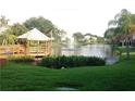 Community gazebo overlooking a tranquil lake at 2 Emerald Bay Dr, Oldsmar, FL 34677