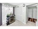 Bright laundry room with ample storage space and built in shelving at 2920 Star Apple Ct, Palm Harbor, FL 34684