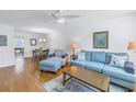 Living room features hardwood floors and comfy seating at 4715 Bay Ne St # 227, St Petersburg, FL 33703