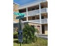 Exterior view of building with parking and signage at 4915 Bay Ne St # 122, St Petersburg, FL 33703