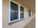 Exterior view of condo building showcasing windows and doors at 4915 Bay Ne St # 122, St Petersburg, FL 33703