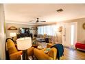 Spacious living room with comfortable seating and large windows at 130 63Rd S St, St Petersburg, FL 33707