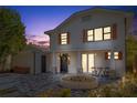 Two-story home with inviting front porch and landscaping at 206 W Frierson Ave, Tampa, FL 33603