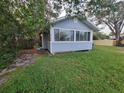 Charming light blue house with a well-maintained lawn at 4736 20Th N St, St Petersburg, FL 33714