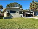 Charming single story home with a well-maintained lawn at 5018 Chancellor Ne St, St Petersburg, FL 33703