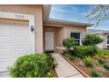 Front entry with walkway and landscaping at 7820 Harbor Bridge, New Port Richey, FL 34654