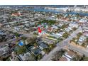 Wide aerial view of home and neighborhood at 7951 Gulf Blvd, St Pete Beach, FL 33706