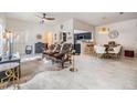 Open living area with stylish furniture and marble floors at 902 Woodbridge Ct, Safety Harbor, FL 34695