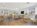 Bright living room with hardwood floors and access to backyard at 12620 Glenn Creek Dr, Riverview, FL 33569