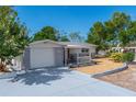 Nice curb appeal with gray stone and a covered porch at 1537 Excalibur St, Holiday, FL 34690