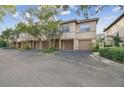 Townhouse exterior with attached garage and landscaping at 901 Normandy Trace Rd, Tampa, FL 33602