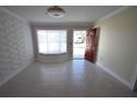 Bright entryway with tile floors and a built-in window seat at 2918 10Th N St, St Petersburg, FL 33704