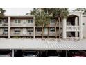 Heather Lake Condominiums building and parking at 920 Virginia St # 207, Dunedin, FL 34698