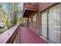 Long wooden deck wraps around the side of the house, offering outdoor space at 5736 116Th N Ave, Pinellas Park, FL 33782