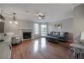 Living room features hardwood floors and fireplace at 1000 Horatio W St # 129, Tampa, FL 33606