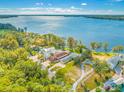 Stunning aerial view of waterfront property with lush landscaping at 188 George S St, Tarpon Springs, FL 34688