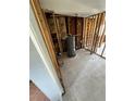 Unfinished bathroom with water heater and tiled floor at 319 80Th Ne Ave, St Petersburg, FL 33702